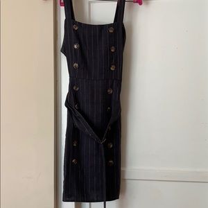 A cute little summer dress with a belt attached!